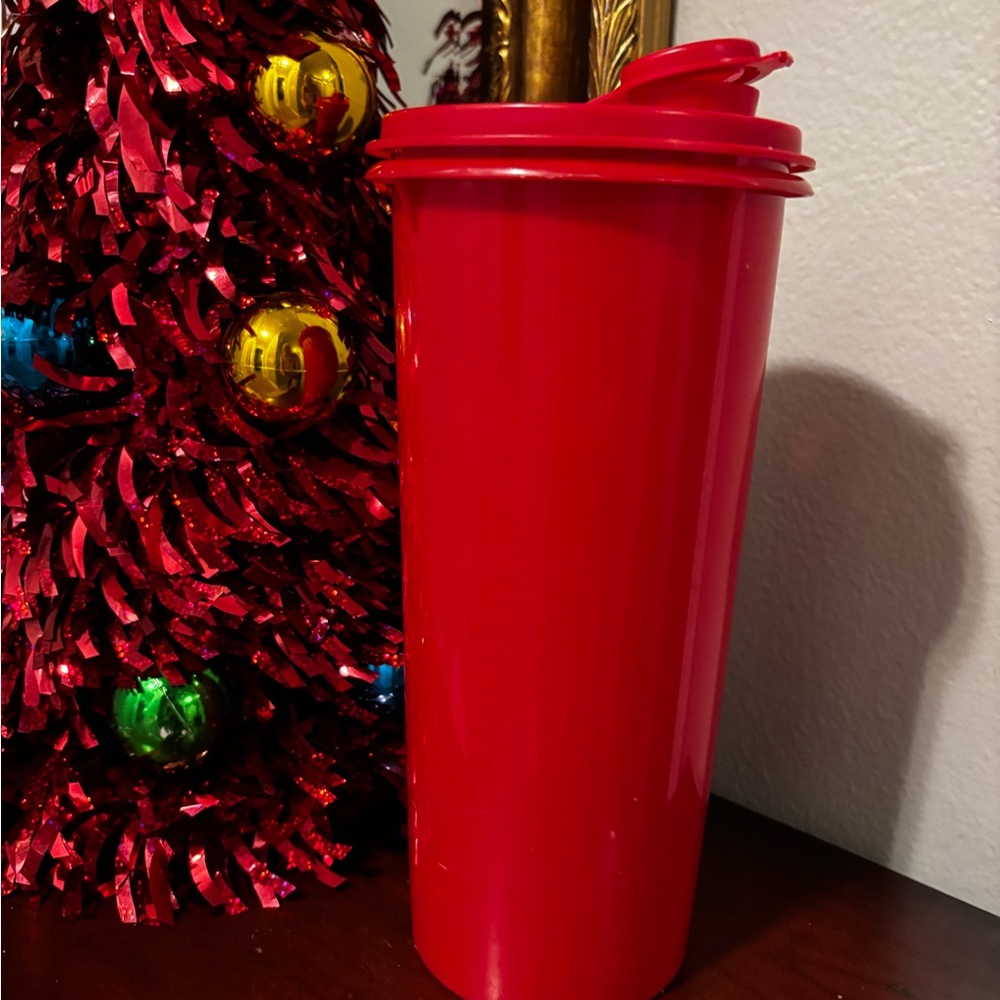 Red Tupperware juice container OR crayon, container, school supplies or milk jug